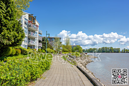 Waterfront walkway along the bank of Fraser river in New Westminster