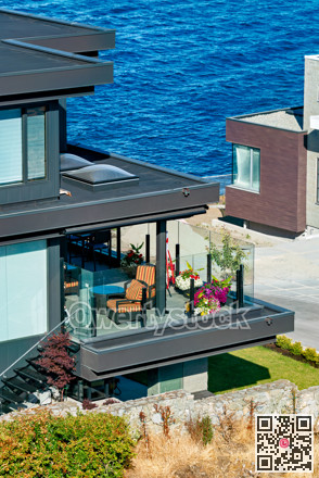 A perfect neighborhood. Patio of luxury residential house on Pacific ocean shore