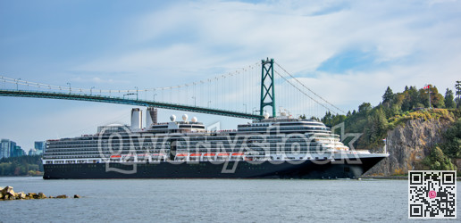 Huge ocean cruise ship passing under famous Lion Gates Bridge. Vancouver, Canada