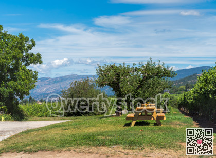 Wooden table in recreation area with beautiful overview of mountains
