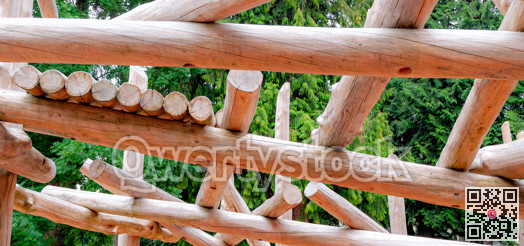 Adventure playground built with wood logs on green leaves backgfound