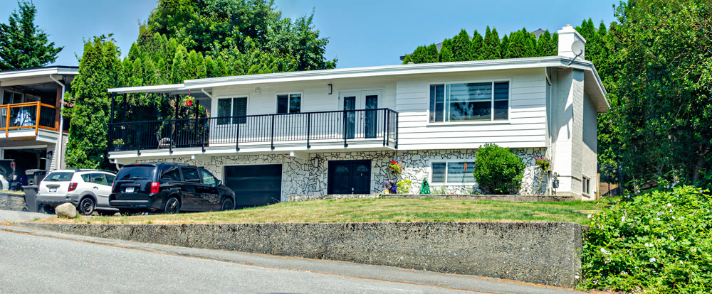 Average family house on land terrace wiith blue sky background