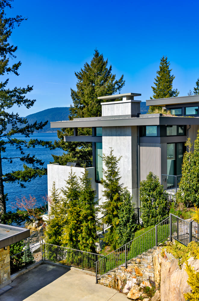 Corner of a residential house with Pacific ocean bay overview