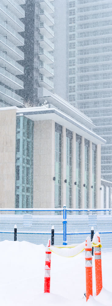 Residential district on the final stage of construction under snow fall in Vancouver