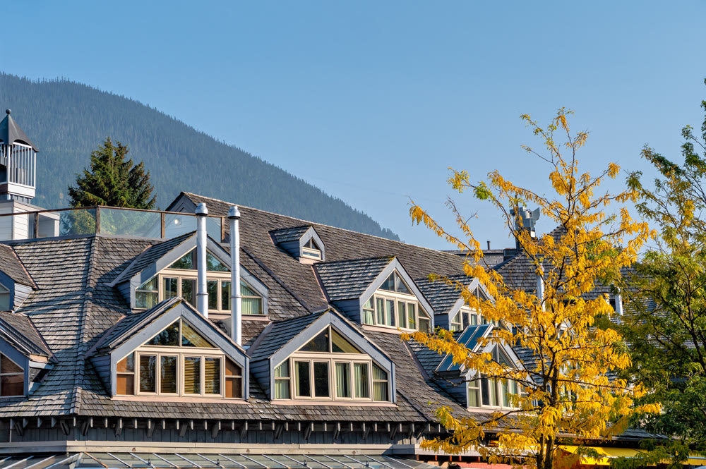 Attic residential units windows on autumn season in Whistler