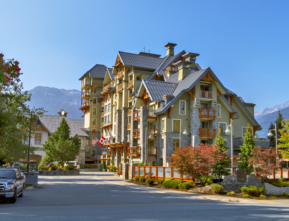 One of a resort residential building on mountain and blue sky background.