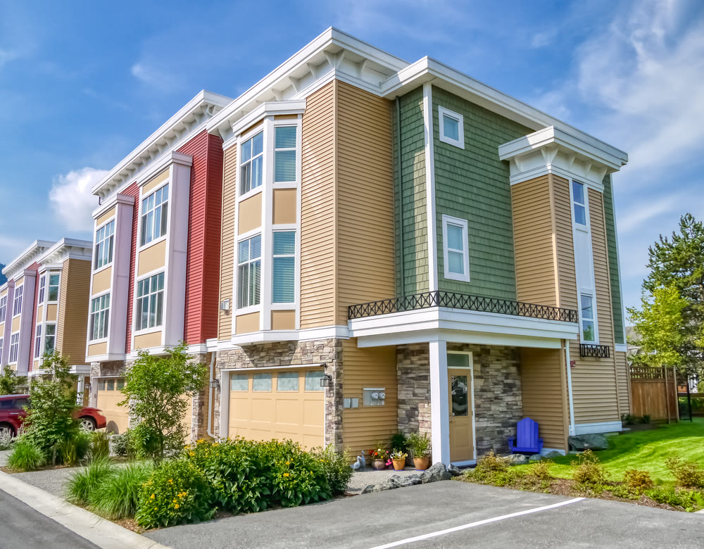Brand new townhouses neighbourhood on a summer day
