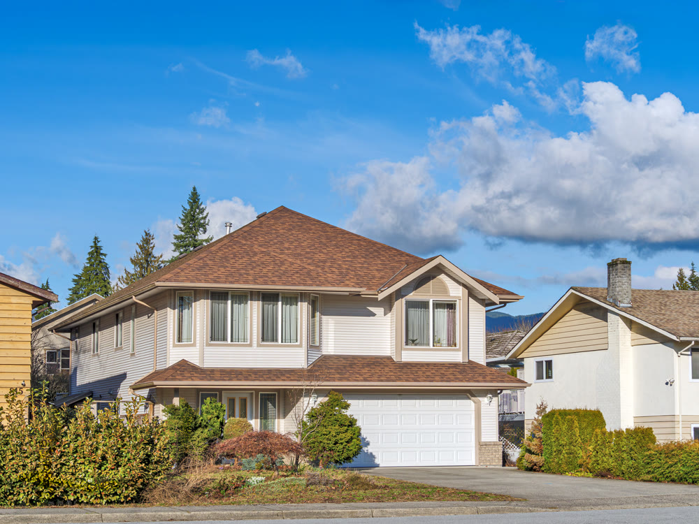 Big residential house on bright winter day in British Columbia