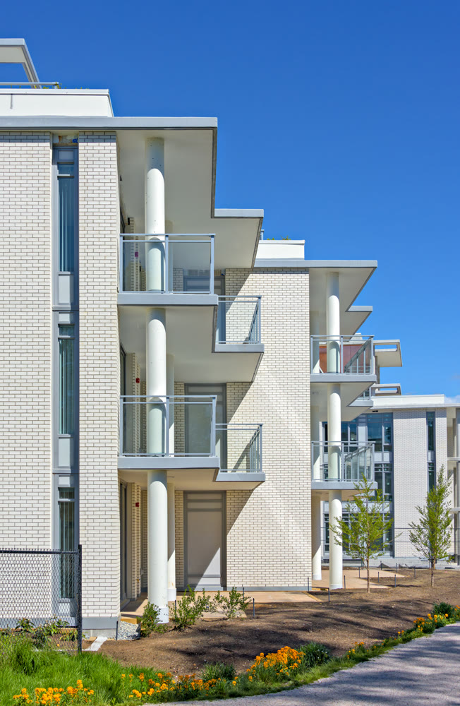 New residential buildings on final stage of construction with blue sky background