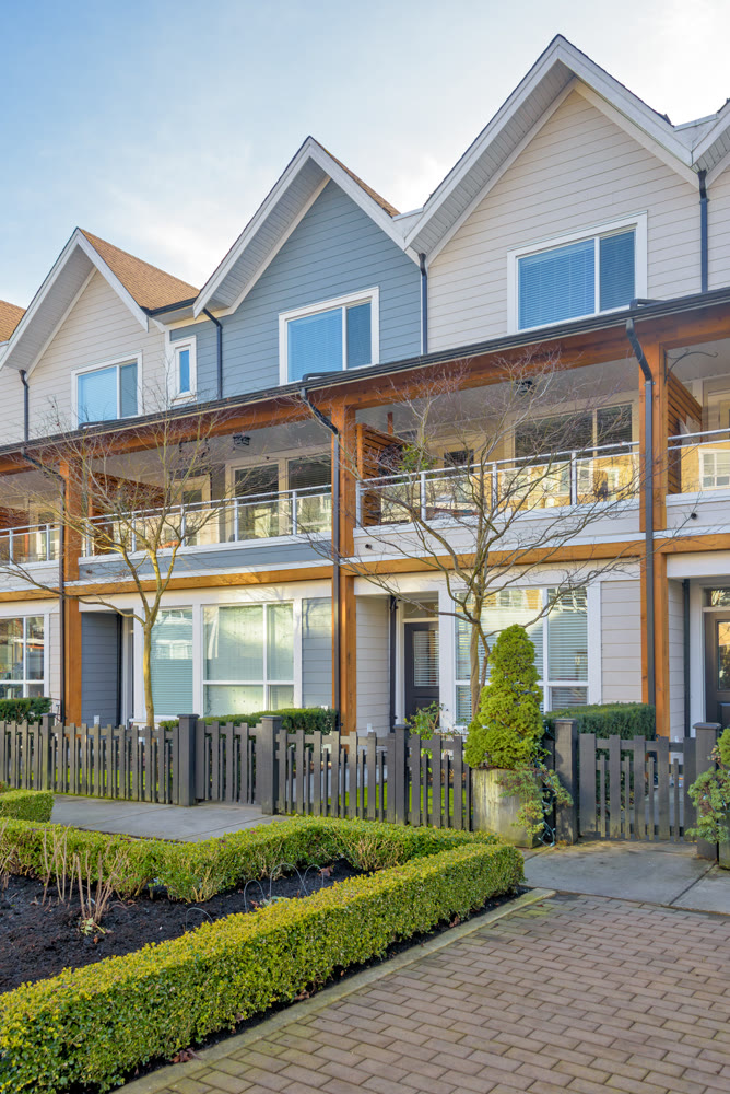 Row of nice residential townhouses on winter day in British Columbia, Canada