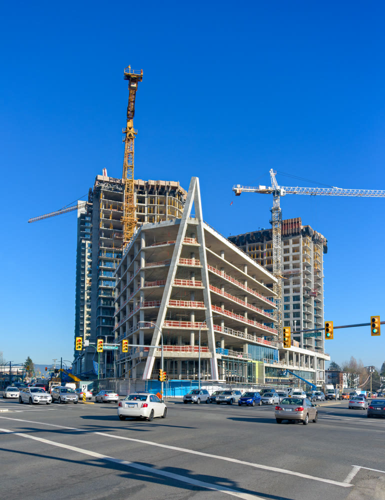 High-rise buildings under constraction on bright sunny winter day