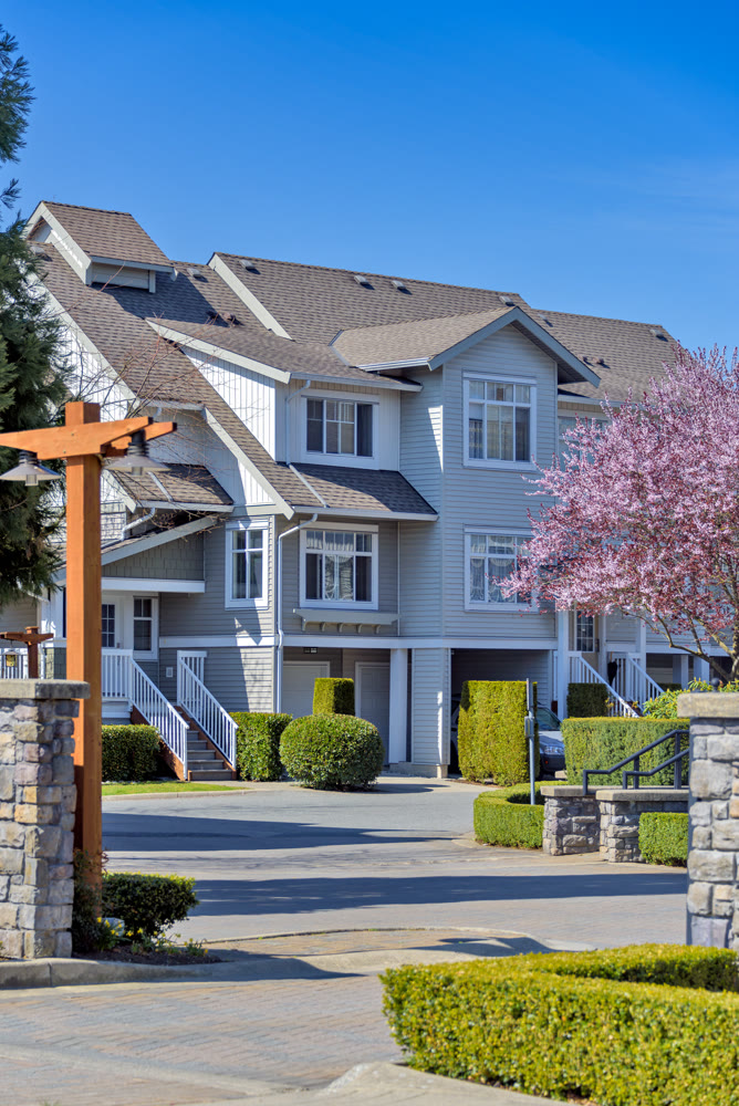 Gated residential complex on spring sunny day in British Columbia