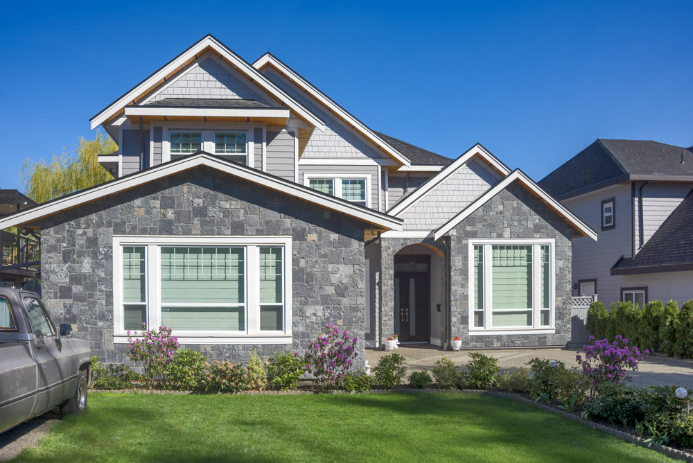 A perfect neighbourhood. Brand new luxury family house on bright spring day