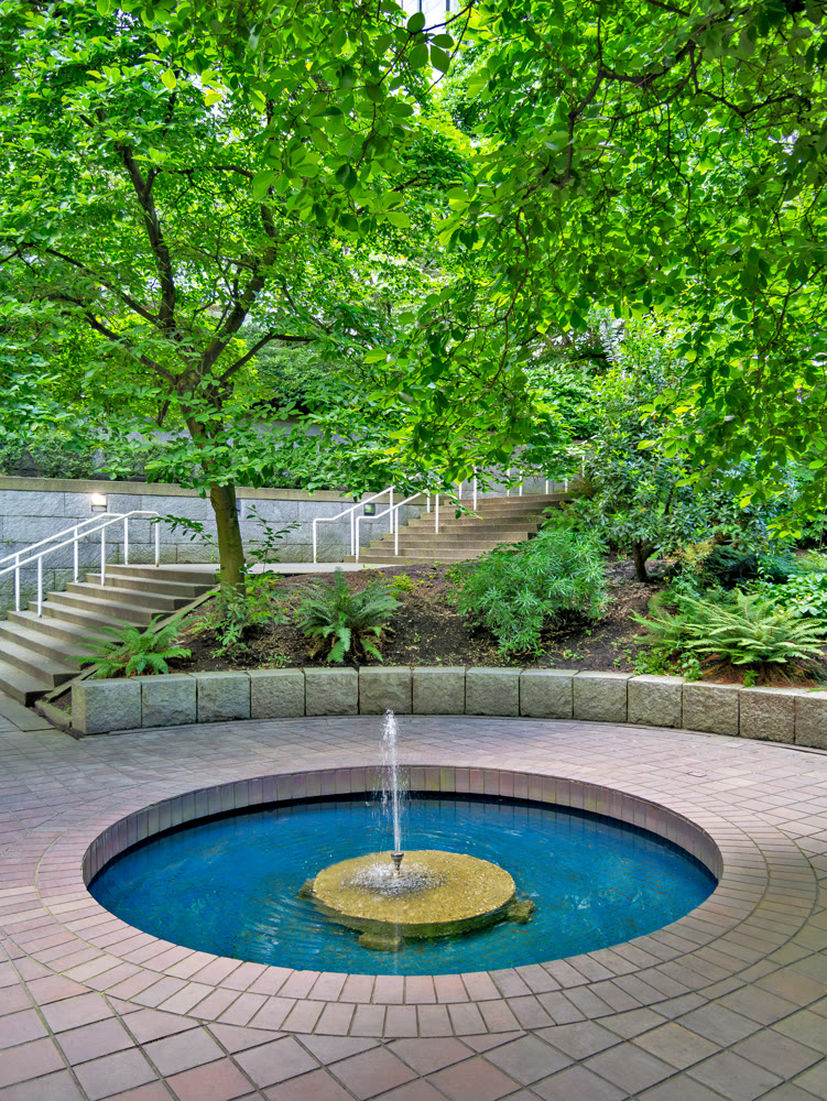 Small inner yard of residential area with fountain in downtown of Vancouver
