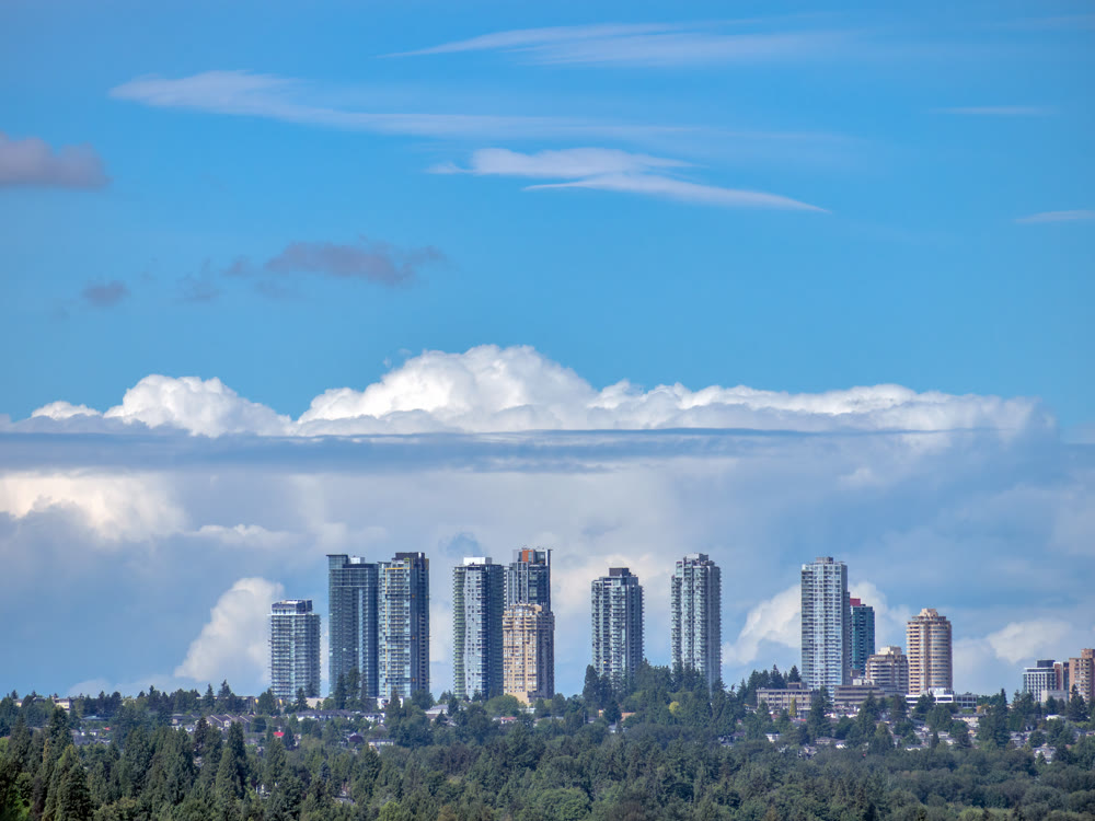 Scenery view of Metrotown cityscape on cloudy sky background