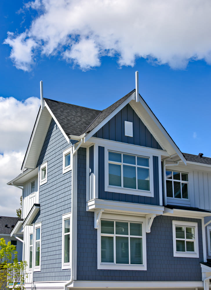 New residential townhouse on bright sunny day
