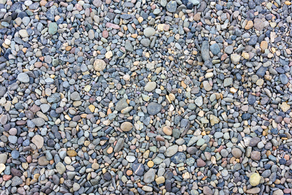 Gravel stones texture background with shallow depth of field
