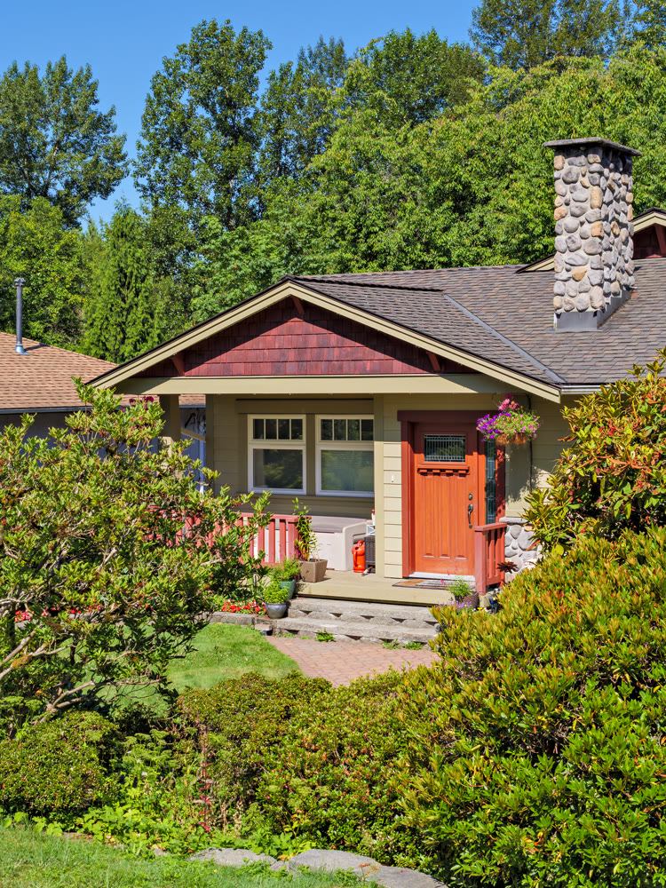 Perfect neighbourhood. Entrance door steps and paved pathway in front of family house main entrance