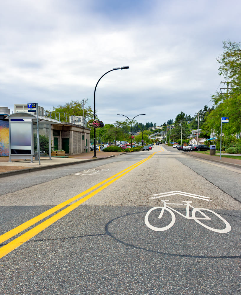 White Rock city street with cycle sign on the asphalt on overcast summer day
