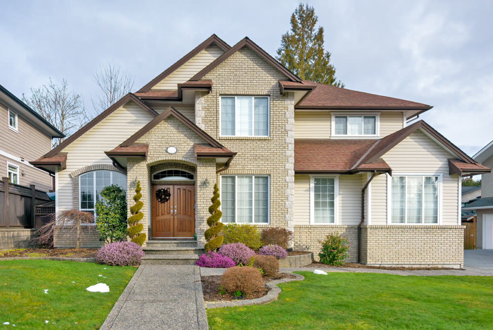 Nicely landscaped front yard of luxury residential house