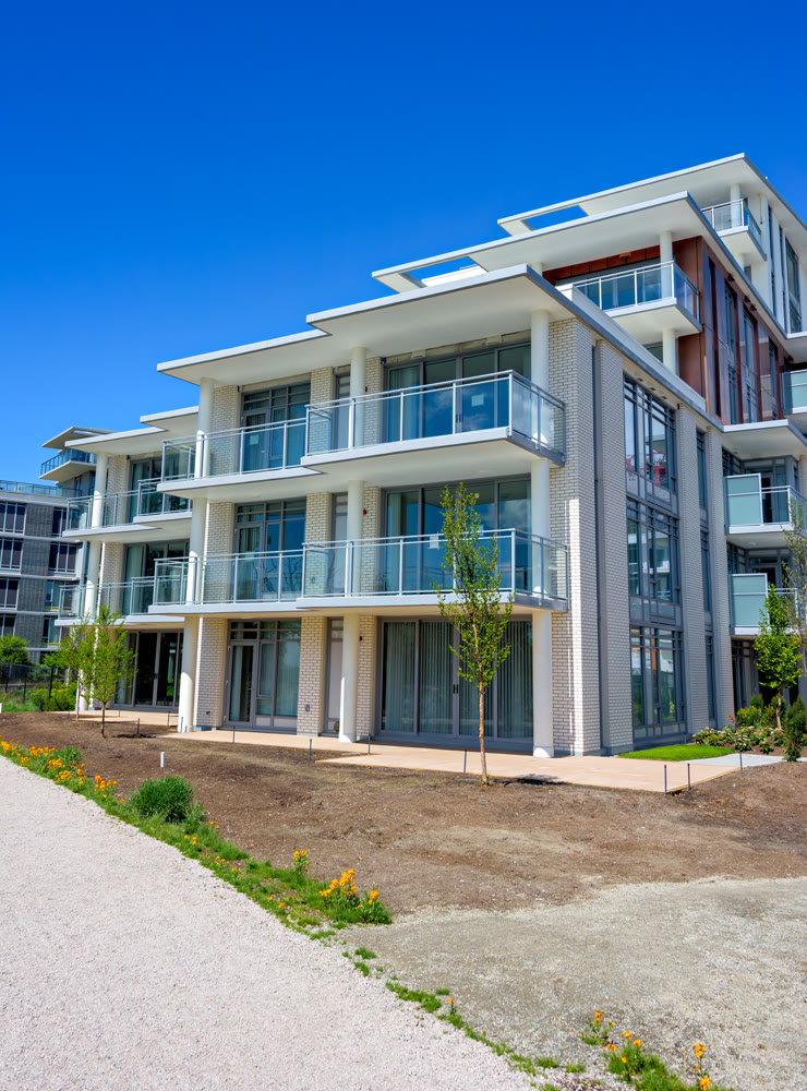 Gravel pathway along the new residential buildings under construction