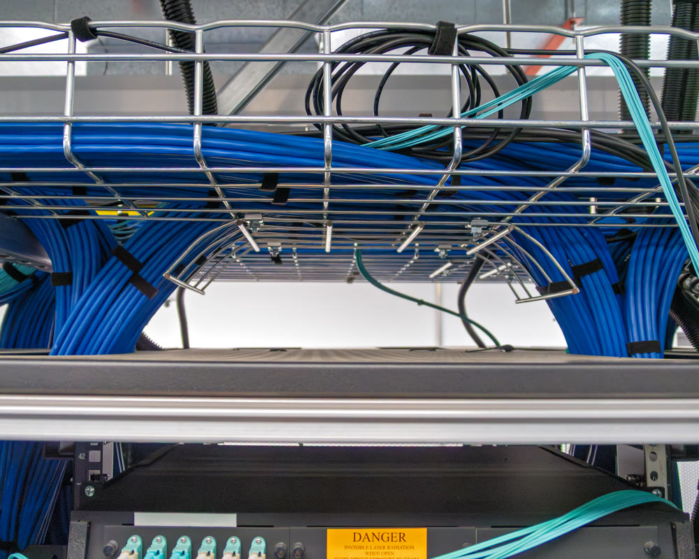 Copper cable infrastructure mounted on the metal wired trays