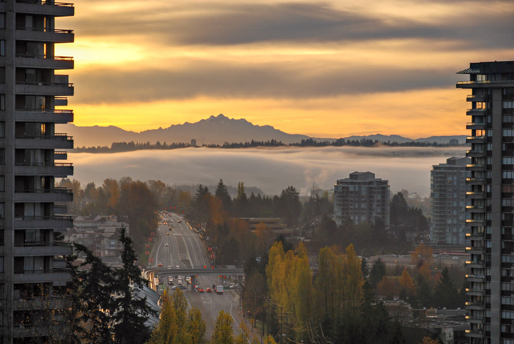 Foggy morning in residential area of greater Vancouver with view at mountain Baker