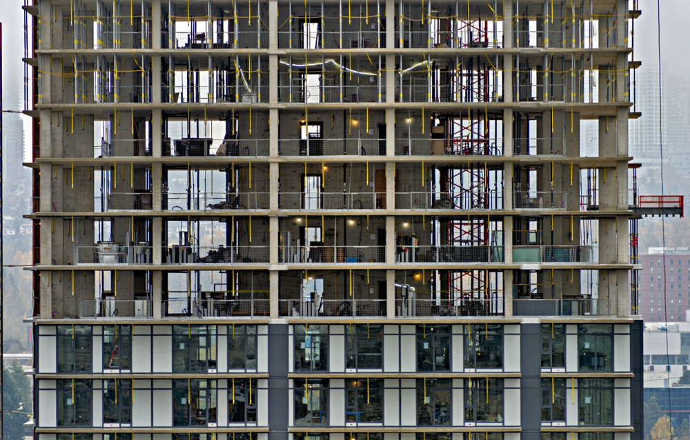 Front side of monolite concrete building under construction