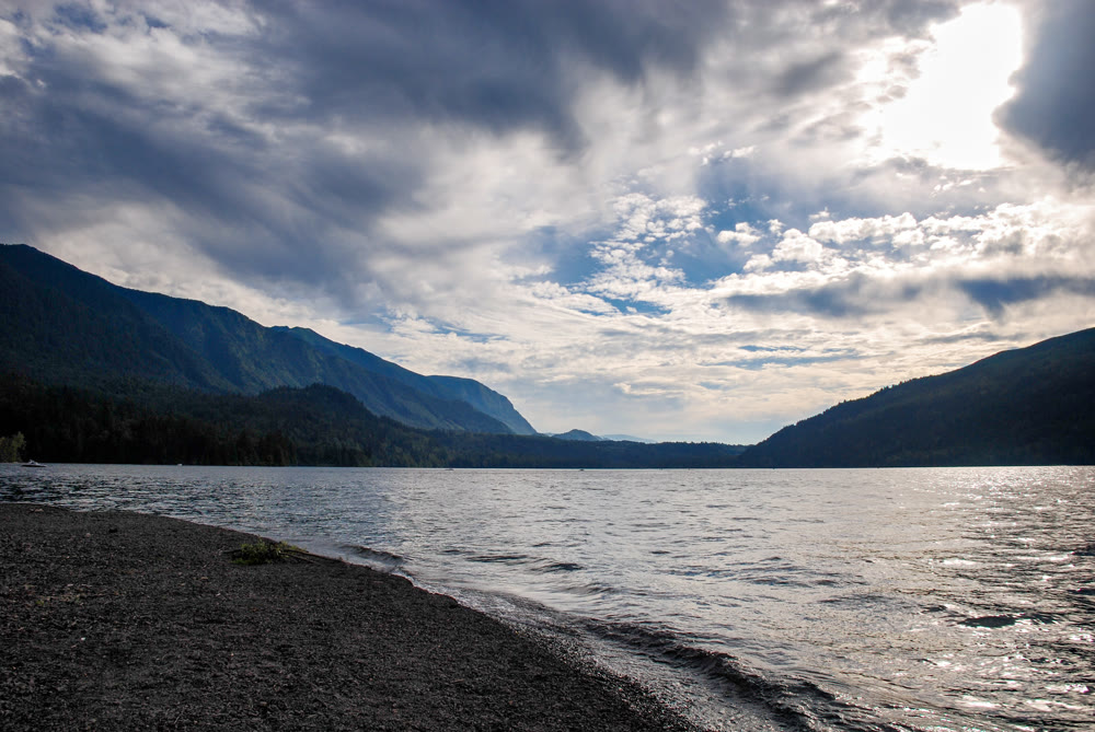 Dramatic Storm Clouds Passing over Caltus Lake and Mountain Landscape