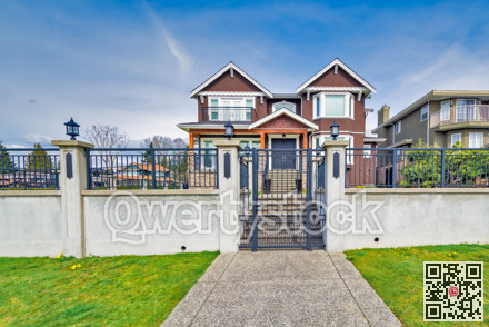 Big family house on blue sky background