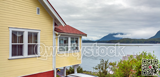 Top of residential building with Pacific ocean overview on coudy day