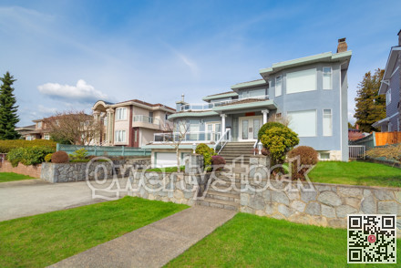 Luxury residential houses with landscaped front yard on land terrace