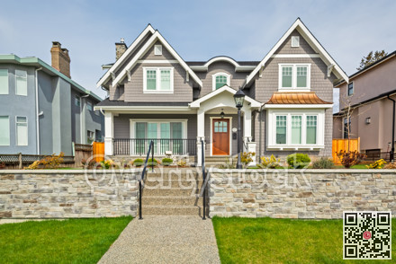 Luxury residential houses with landscaped front yard on land terrace