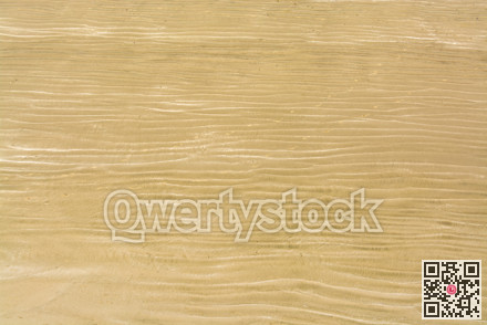 Waves of sand on one of Pacific ocean beaches