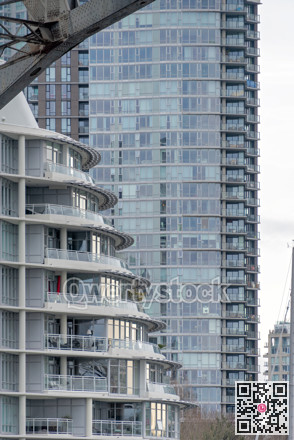 Front of residential buildings in downtown of Vancouver on a winter day