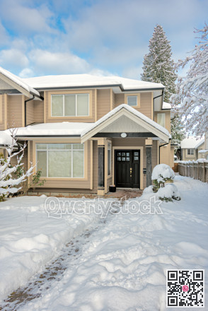 Snow cleared way to the residential house entrance on winter season