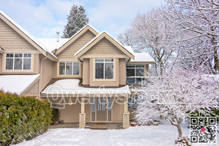 A perfect neighborhood. Entrance of nice residential house in snow