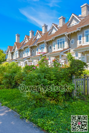 Residential townhouses on sunny day in Vancouver, British Columbia, Canada.