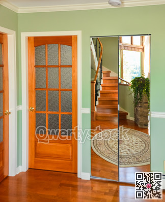 Wooden french doors. Interior design of luxury residential house.