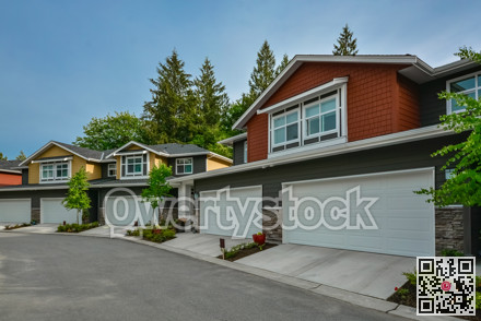 Street of brand new residential triplex houses ready for moving in