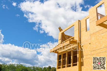New residential building under construction on blue sky background