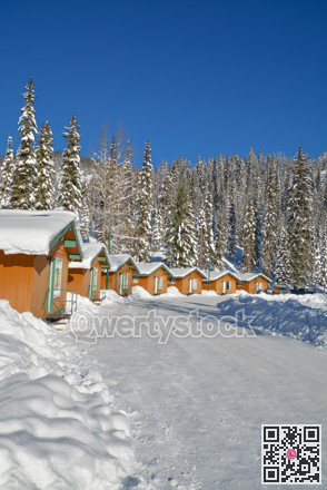 Row of houses in snow in Manning Park, BC.