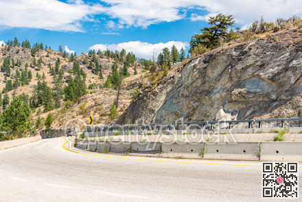 Tight bend of mountain road in Okanagan valley, British Columbia.