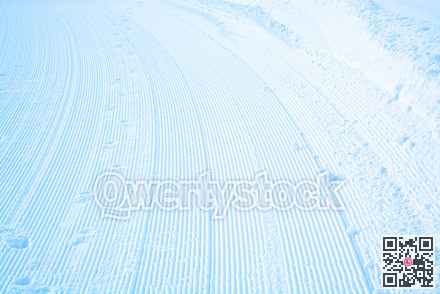 Stripes on snow surface profiled for future ski trace.
