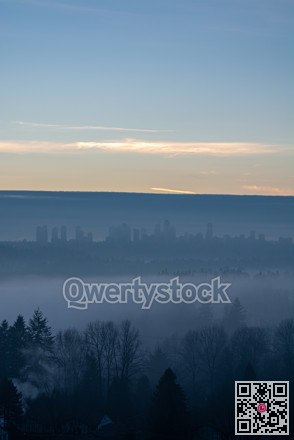 Clear sky above Metrotown covered with thick fog