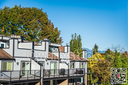 Top of new residential building on blue sky background