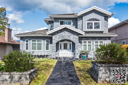 Nice residential house with stone texture walls and stone walls on front yard