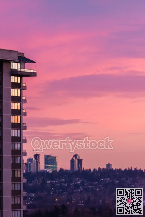 Sunset view from high-rise building on crimson sky background