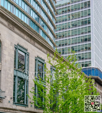 Heritage and modern buildings facades in downtown of Vancouver, Canada