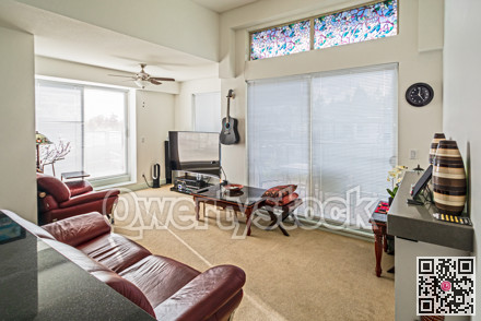 Living room interior with red sofas big screen and guitar on the wall